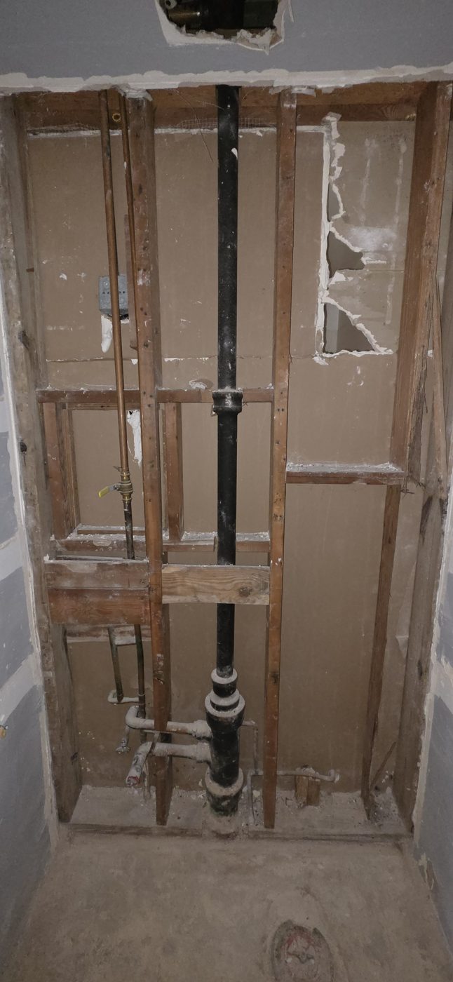 Storage room plumbing reveal